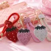 The pink strawberry-shaped keychain is a cute and girlish pendant that is small and portable Specification image